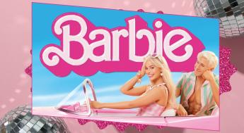 pink background barbie and ken driving in a pink convertible