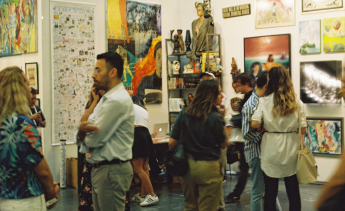 People at art gallery exhibition