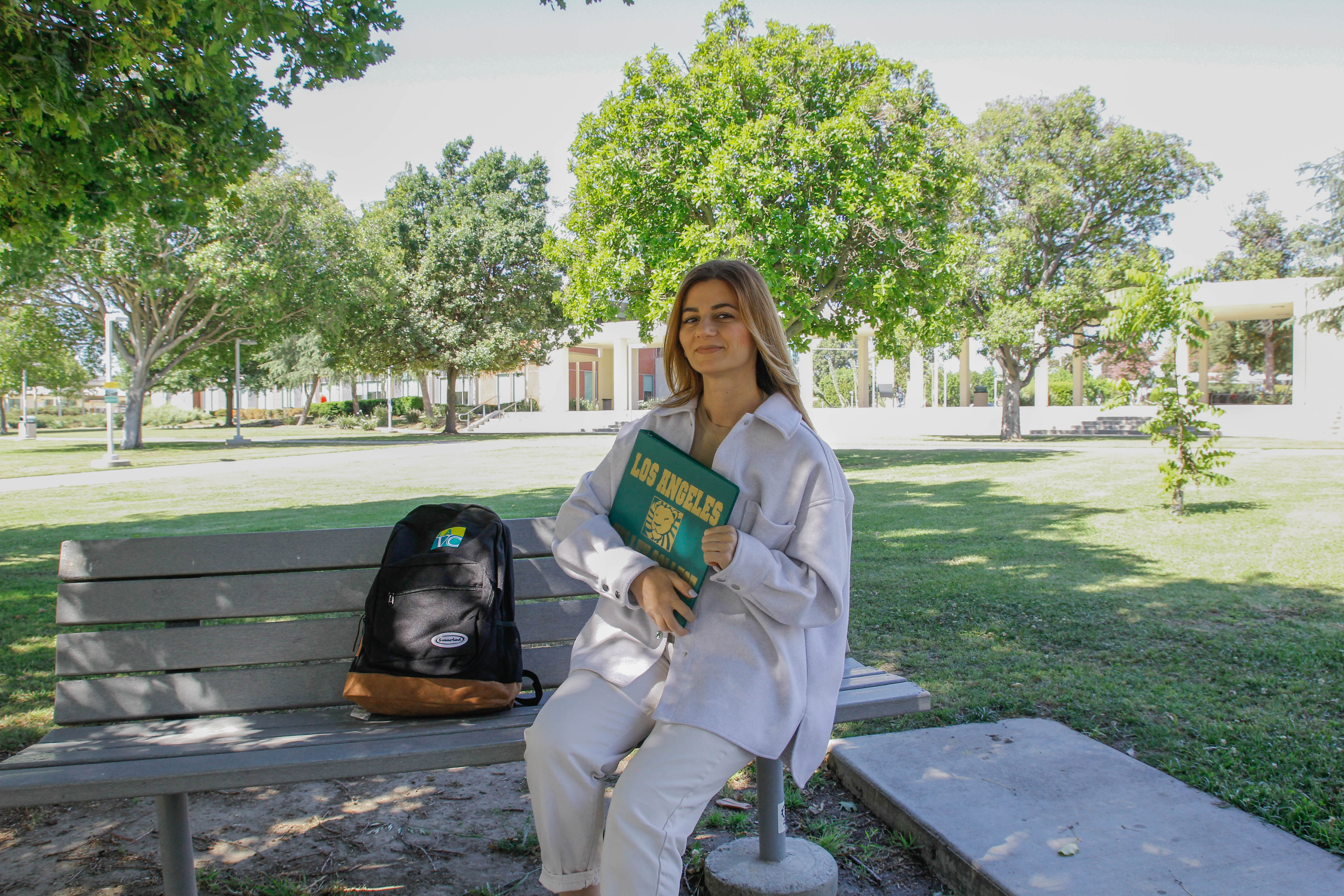 Blonde Student Holding a Book