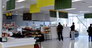 Students ordering food in the Monarch Cafe Cafeteria