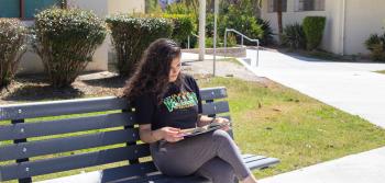Student Kristin Yegoyan Sitting Reading
