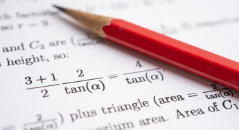 Pencil ontop of a worksheet with an algebratic equation