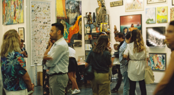 People at art gallery exhibition