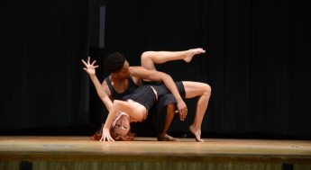 A male and female modern dancers performing