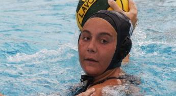 Women's Water Polo player holding a ball