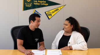 Student meeting with her academic counselor