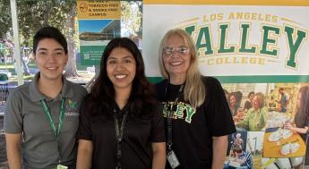 Mosaic Village team tabling for a registration event 