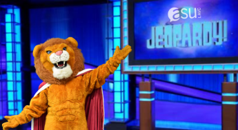 lion mascot on the blue jeopardy set