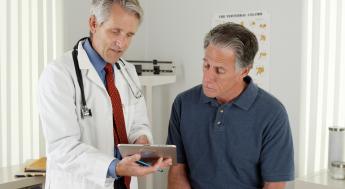 Doctor talking with patient