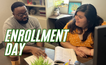 Student meeting with counselor at Enrollment Day