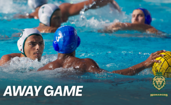 Monarchs Men's Water Polo game scene featuring players on the pool with the text "away game" in the bottom left corner. 