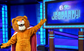 lion mascot on the blue jeopardy set