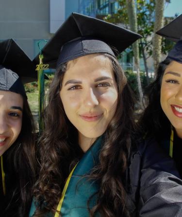 Three Graduated Students