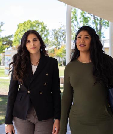 Students Walking Through Campus