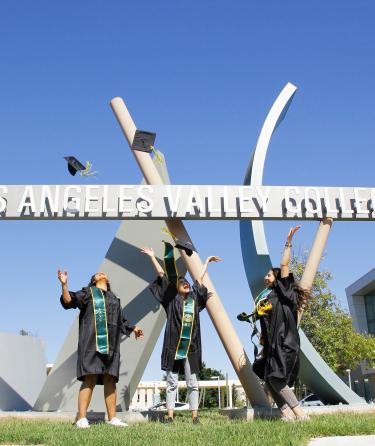 Graduates Throwing Hats