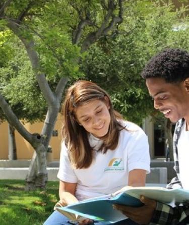 2 students sitting together