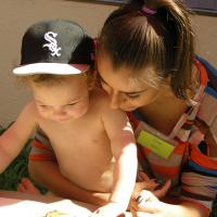 Student Carrying a Child