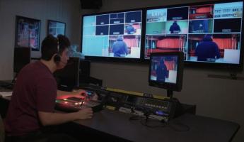 Student working in the TV Studio Control Room