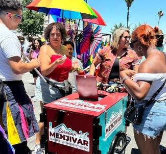 San Fernando Valley Pride with students and Senator Mejivar giving out paletas