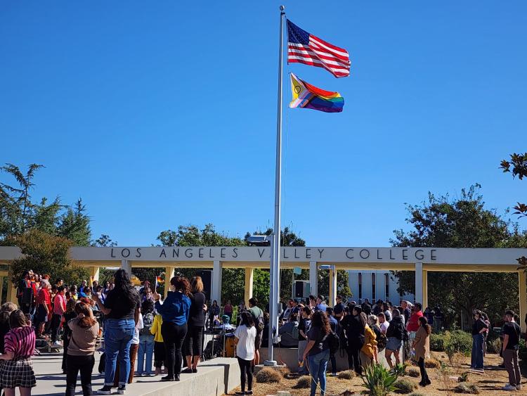 Picture of the Progressive Pride Flag raised at LAVC for National Coming Out Day