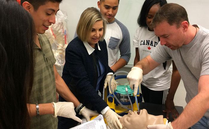 Students Practicing on a Mannequin