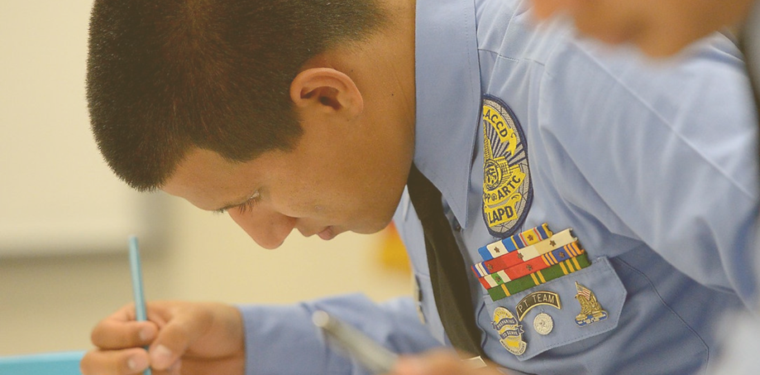 Esteban G. Signing paper