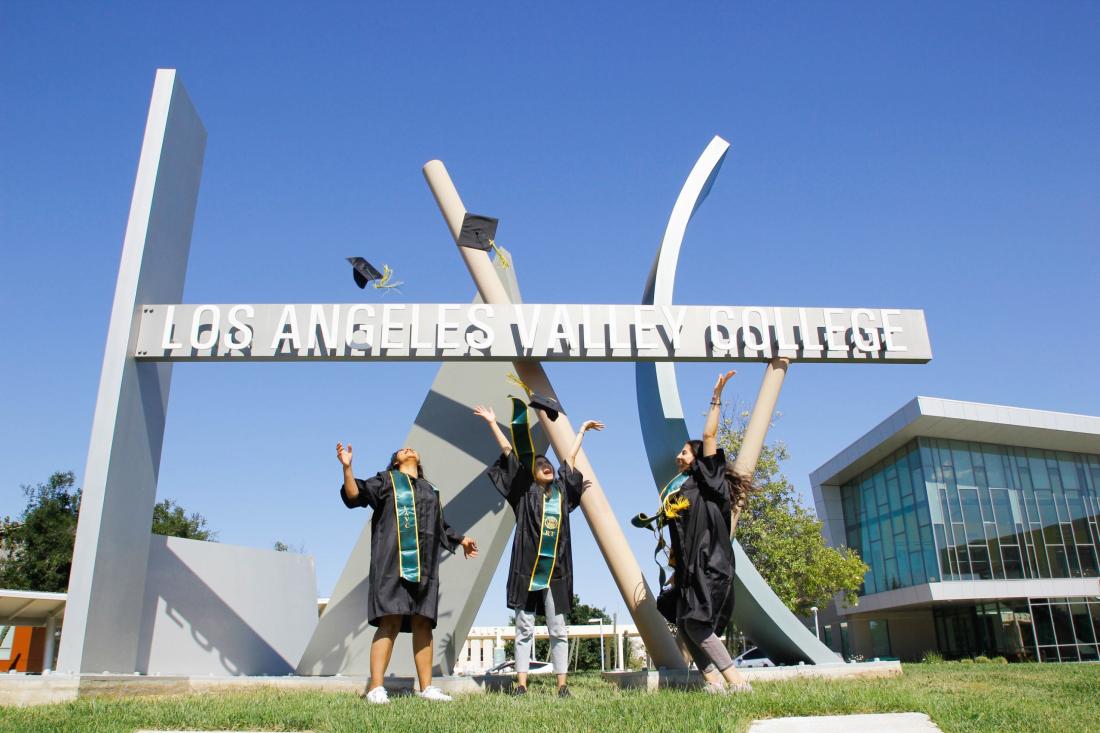 Three Graduates Celebrating