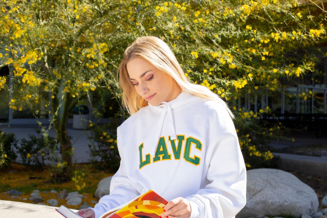 Christine Birchfiel Smilling Reading a Book