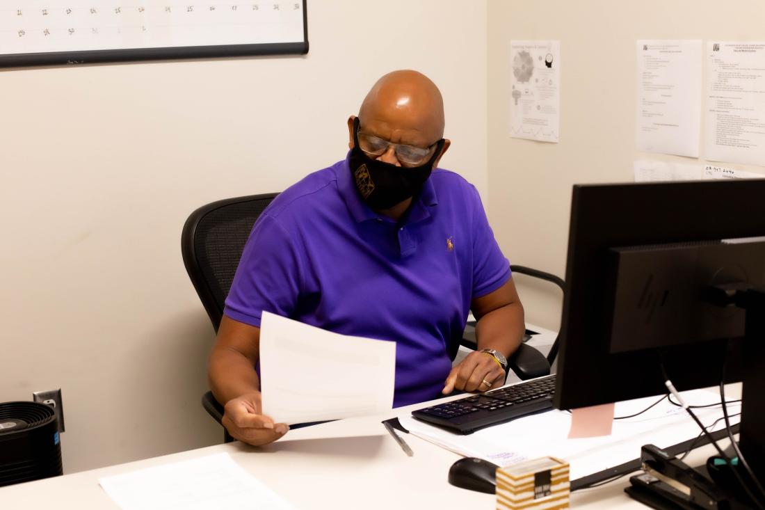 Clive Reading at Office