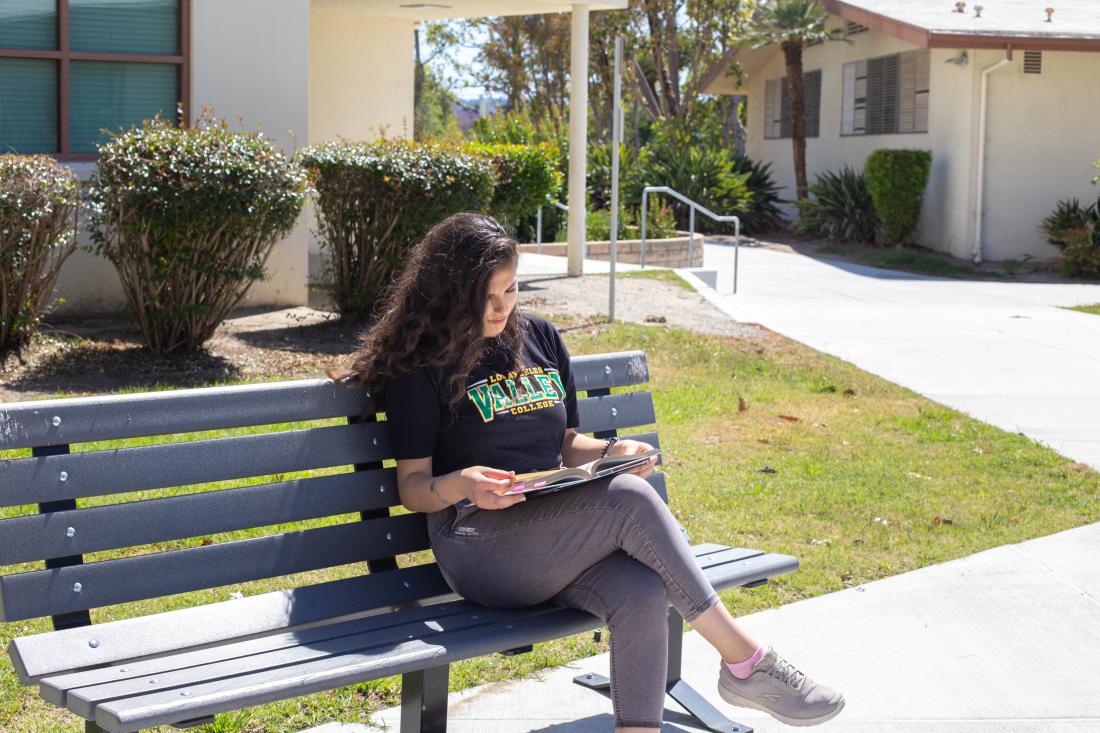 Student Kristin Yegoyan Sitting Reading