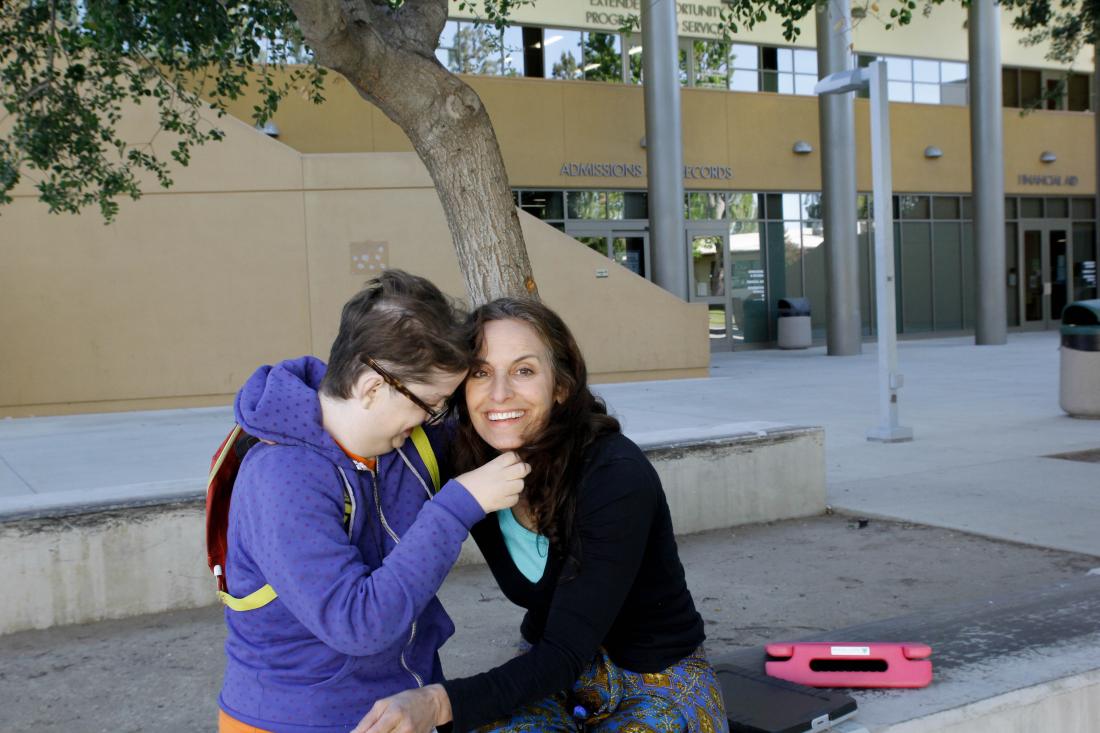 Student and Teacher at School