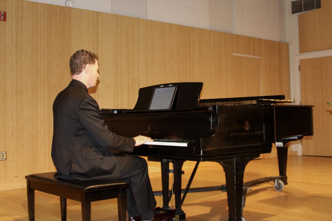 Pianist playing on stage