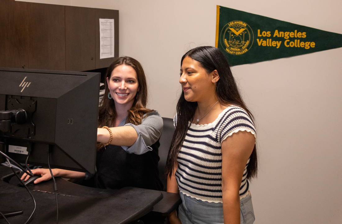 Counselor providing academic counseling to a student