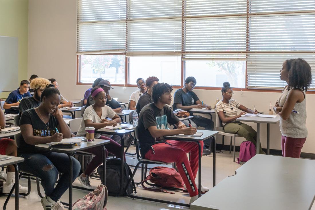 Students sitting in a classroom learning