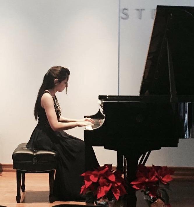 Student playing piano