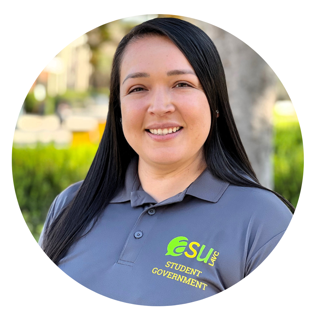 woman with long dark hair wearing a gray polo shirt with ASU green and yellow logo