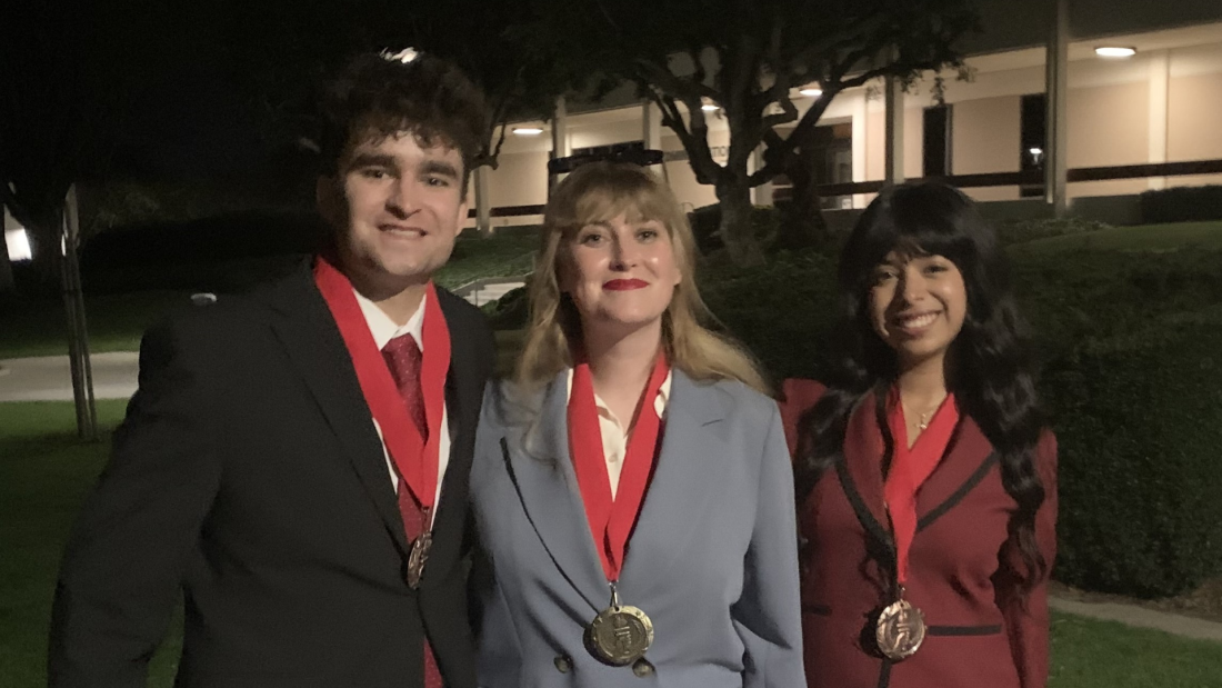 Max Goss, Jessica Soderquist and Ashley Martinez-Romero wearing their medals