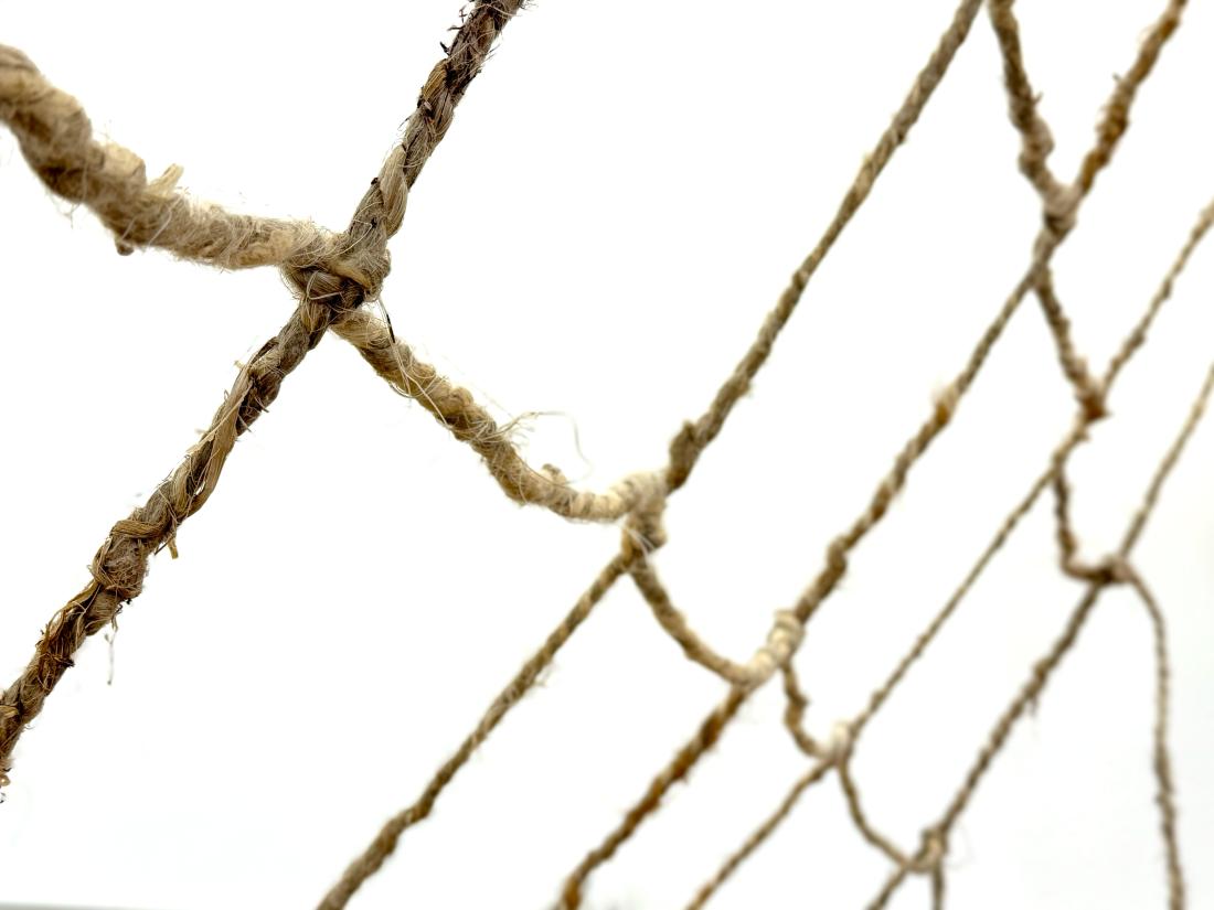 close view of hand woven net