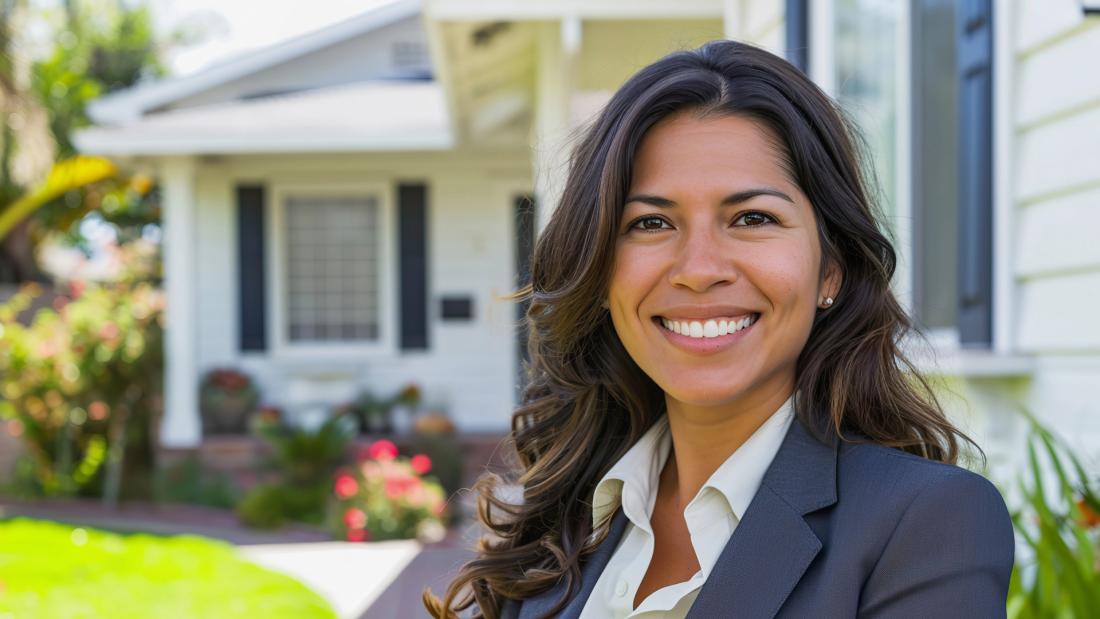 Realtor in front of a house