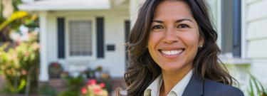 Realtor in front of a house