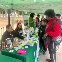 Student talking with staff at Enrollment Day