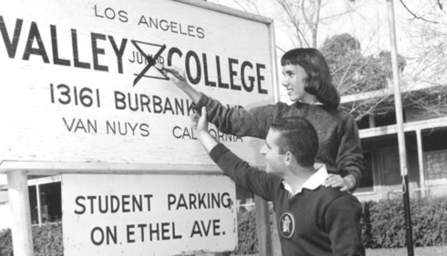 Students cross out the word "Junior" in the Los Angeles Valley Junior College sign