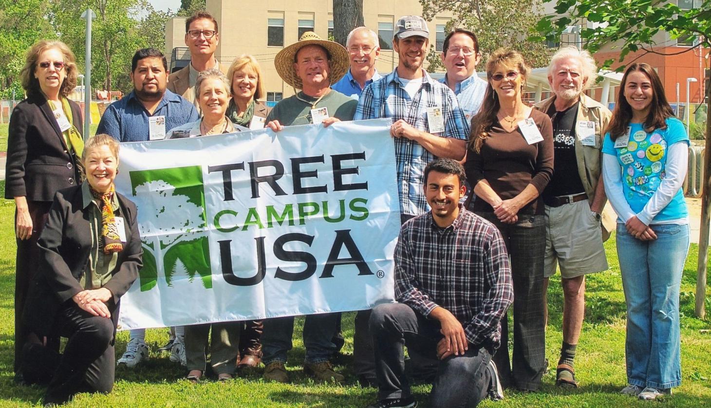 LAVC faculty, staff and students with Tree Campus USA banner